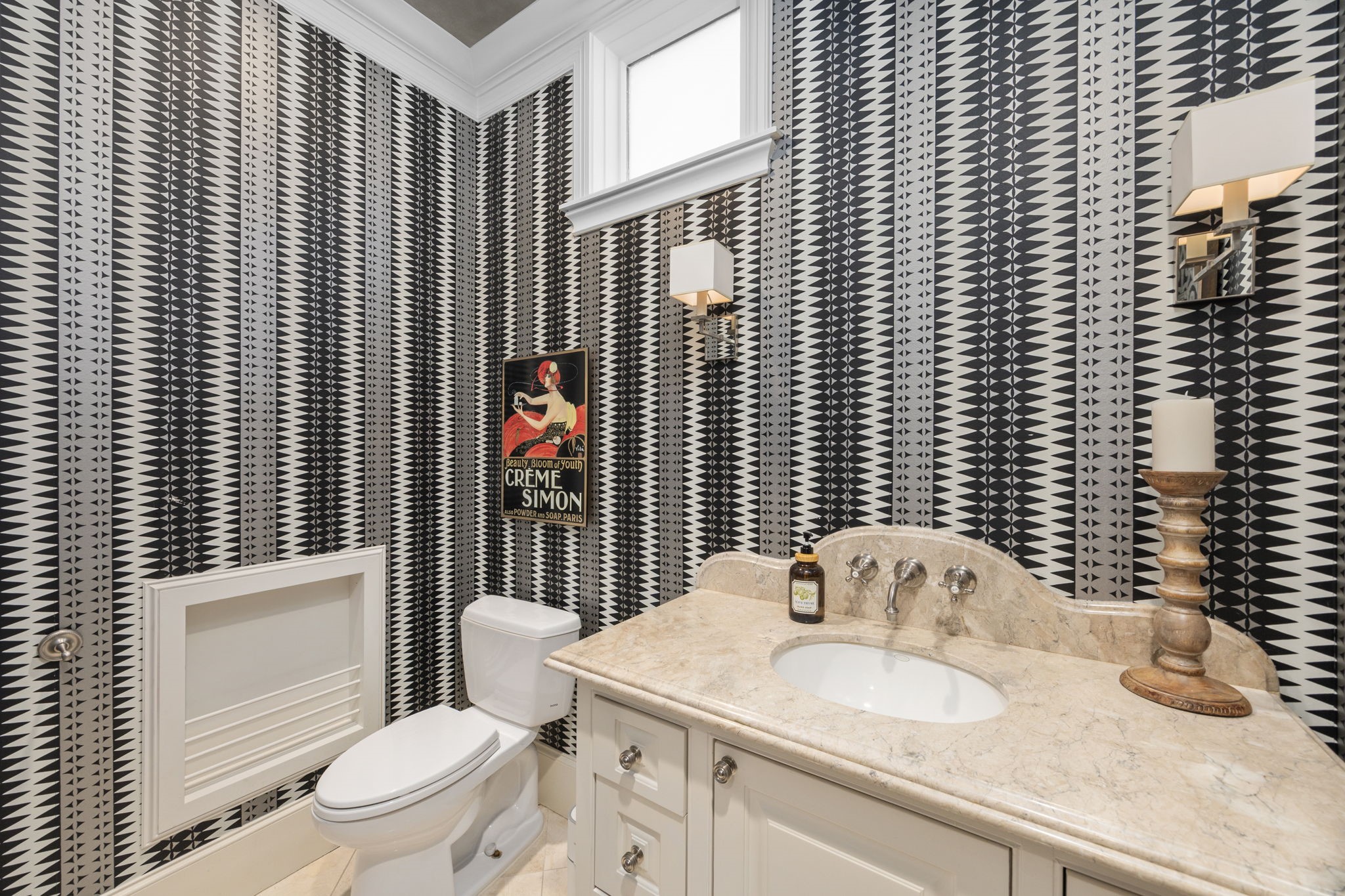 1723 Sunset Boulevard Houston, TX 77005 - Photo 21 of 50 The stylish second-floor powder bath makes a statement with bold designer wallpaper, modern fixtures, and a polished look perfect for guests.