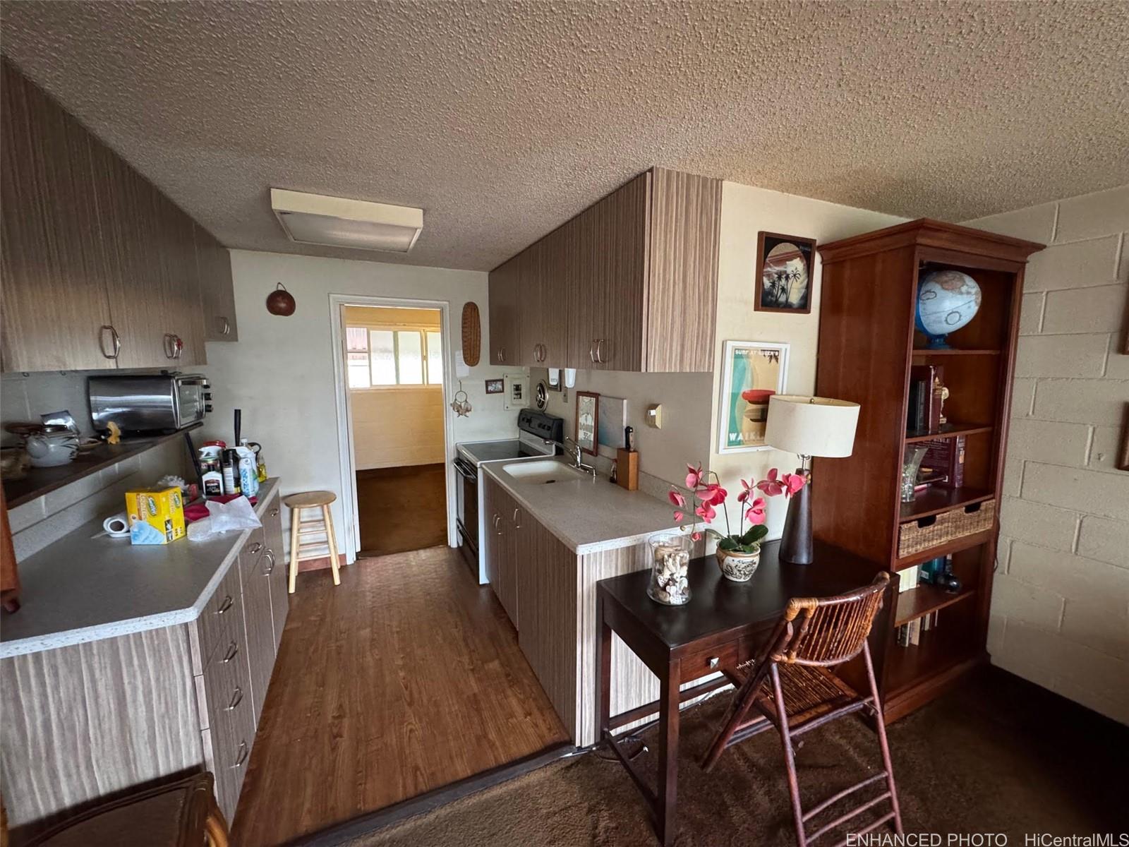 1427 Alexander Street, Unit 202 Honolulu, HI 96822 - Photo 11 of 16 Picture before being enhanced