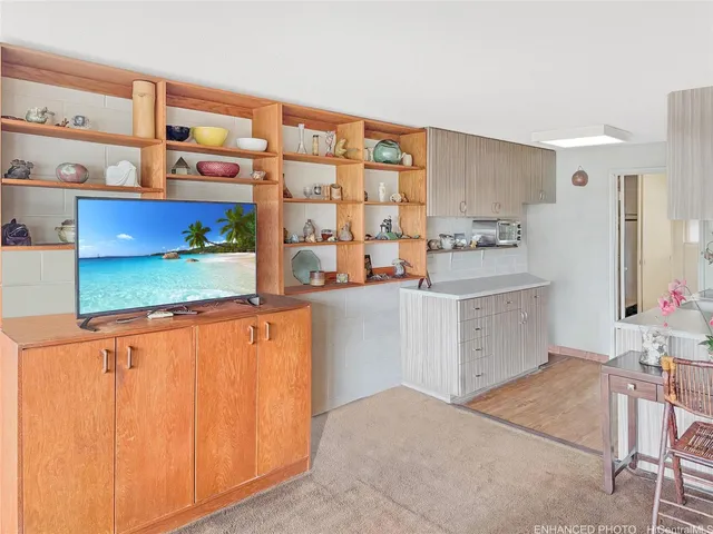 a kitchen with stainless steel appliances granite countertop a sink and cabinets