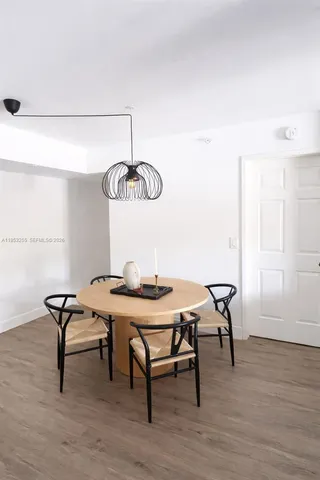 a view of a table and chairs in a room