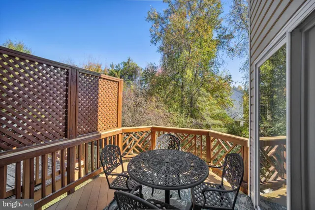 a view of balcony with furniture