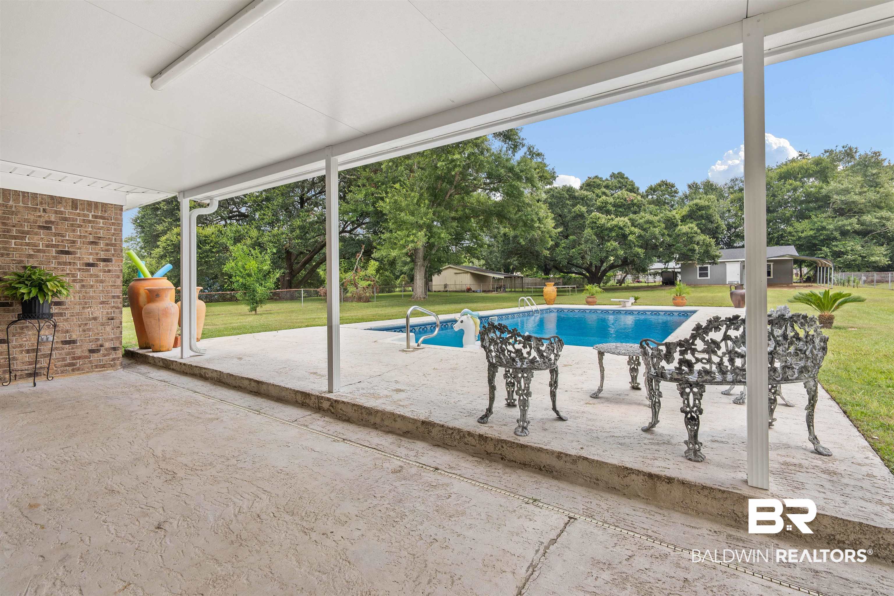 2000 Campfire Drive Semmes, AL 36575 - Photo 22 of 26 View of pool featuring a lawn and a patio area
