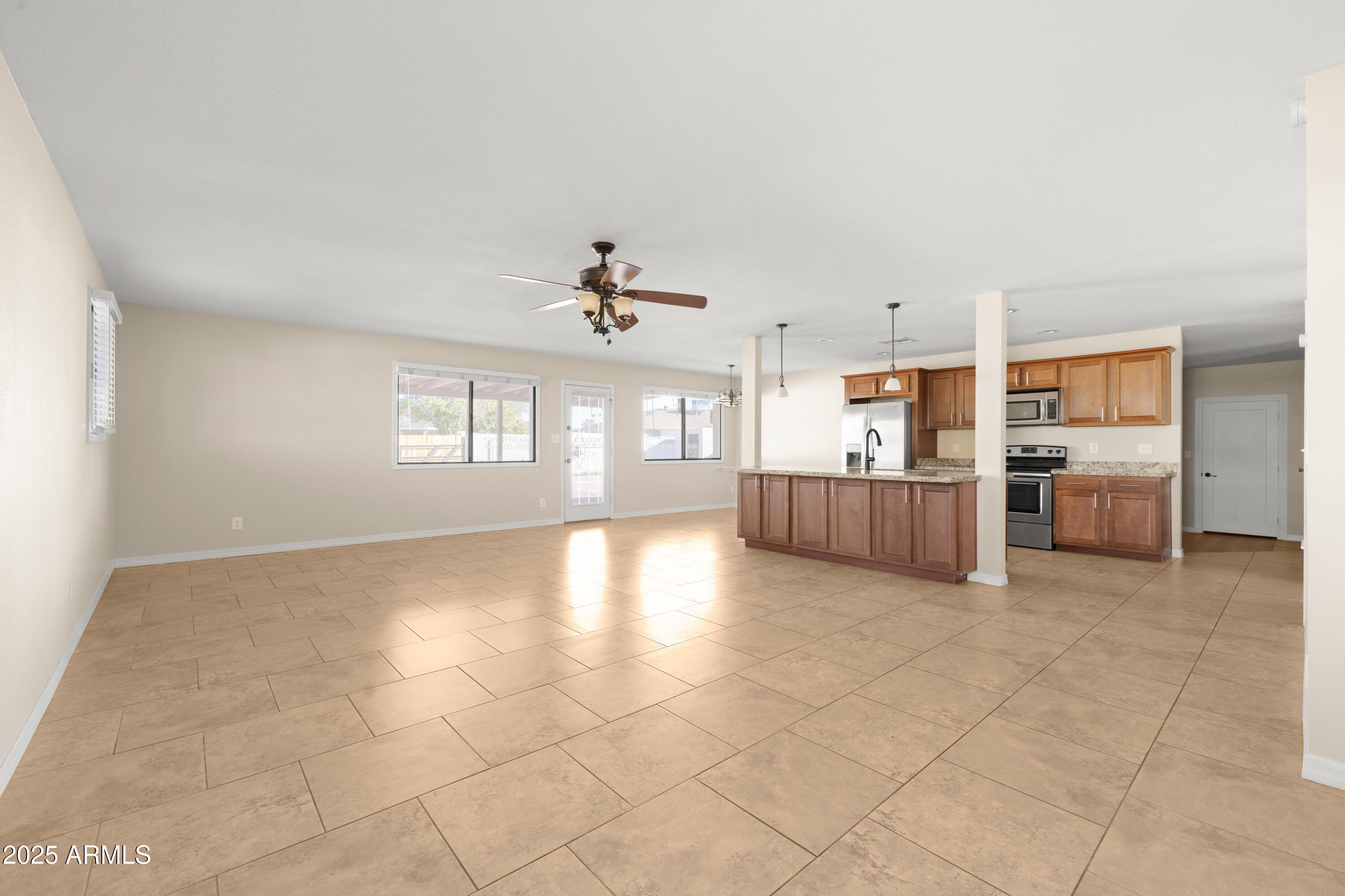 2715 South Rita Lane Tempe, AZ 85282 - Photo 3 of 30 a view of a kitchen with furniture and windows