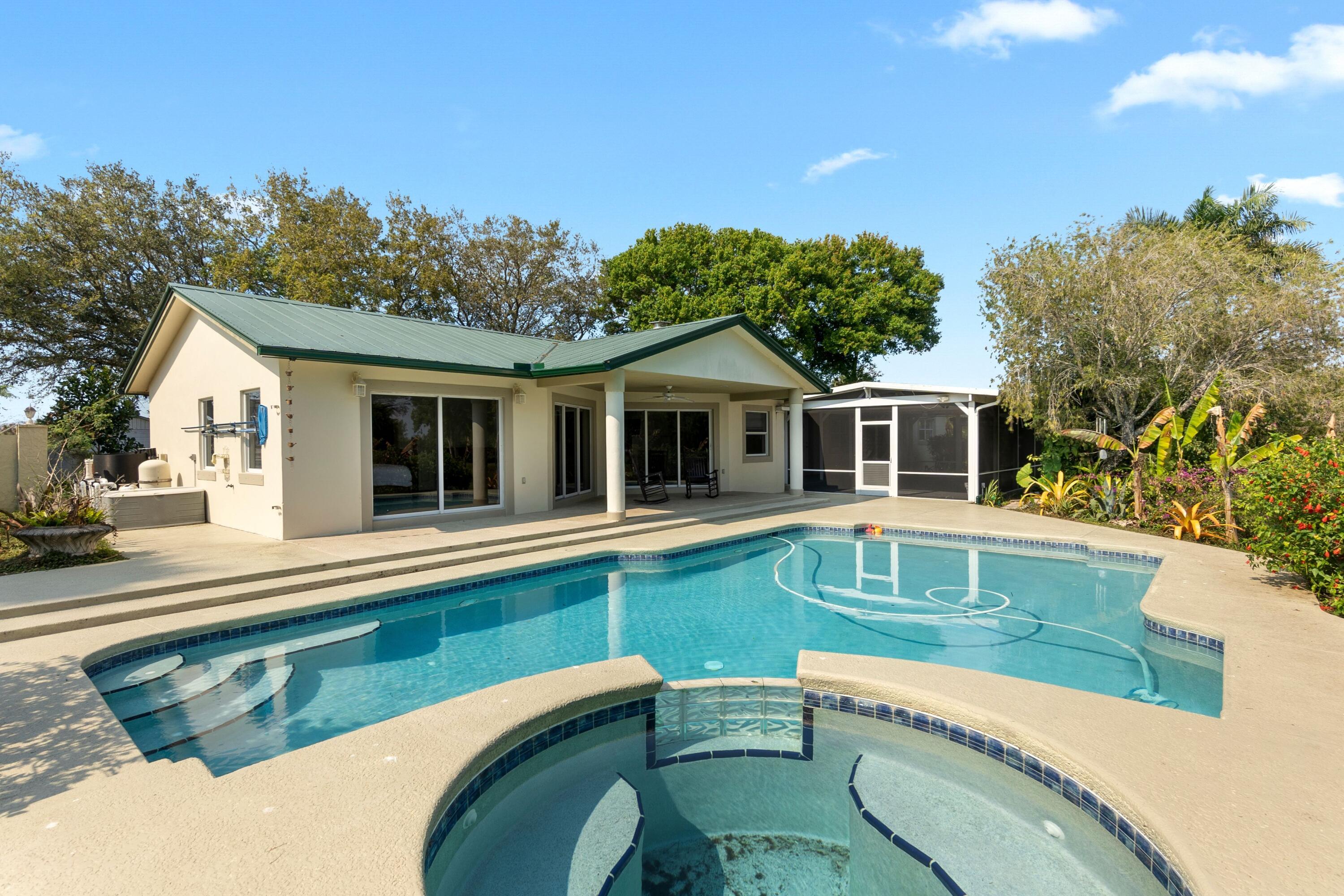 10750 Southwest Fox Brown Road Indiantown, FL 34956 - Photo 27 of 42 Pool view with jacuzzi