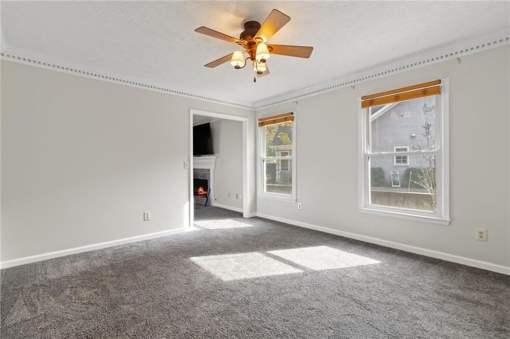650 Corbin Lake Court Atlanta, GA 30350 - Photo 11 of 42 wooden floor in an empty room with a window