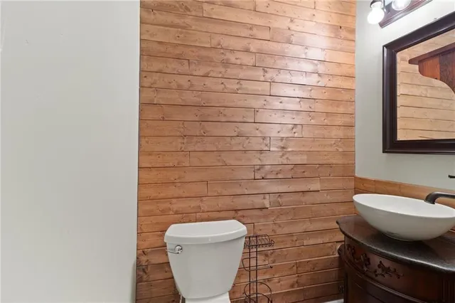a bathroom with a toilet and a sink