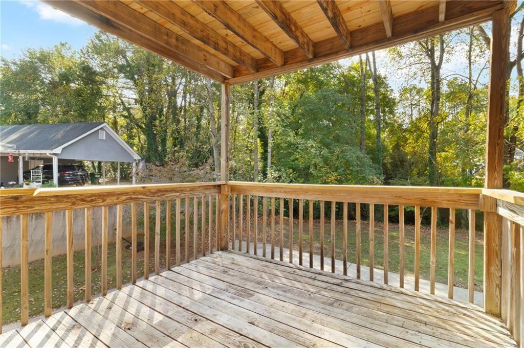 650 Corbin Lake Court Atlanta, GA 30350 - Photo 32 of 42 a view of a wooden roof deck