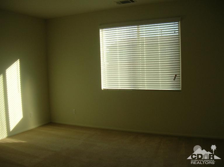 82797 Mount Riley Drive Indio, CA 92203 - Photo 8 of 17 a view of a room that has a window in it