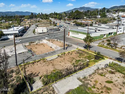 a view of a city with an ocean