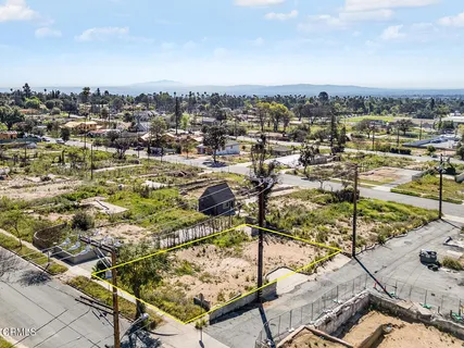 a view of a backyard of the house