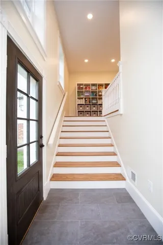 a view of staircase with large window