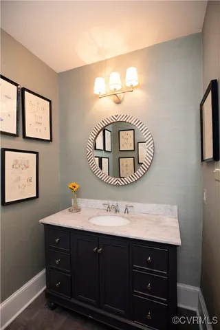 a view of wooden floor and dining room with wooden floor