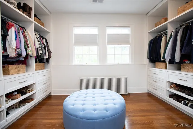a spacious bathroom with double vanity sink