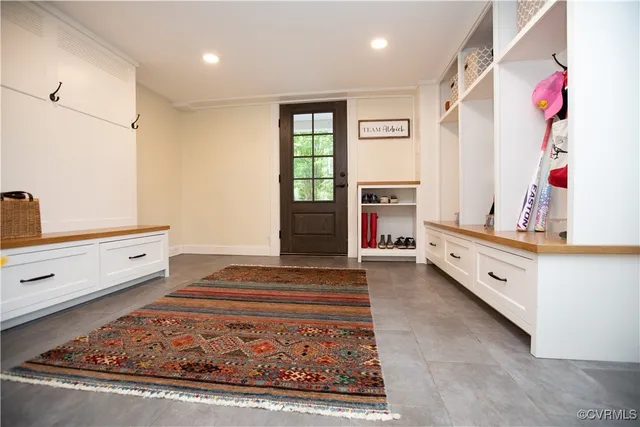 a room with toys and a chandelier