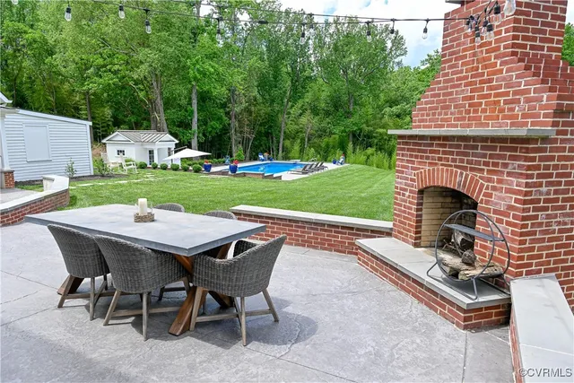 a wooden fence with some plants in the back yard