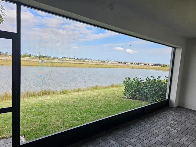 a view of swimming pool from a window