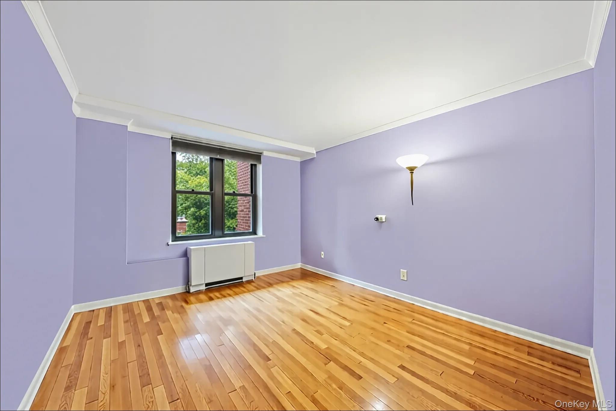 18-35 Corporal Kennedy Street, Unit 2B Queens, NY 11360 - Photo 12 of 25 a view of empty room with window