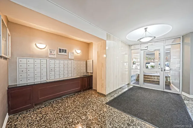 a view of a dining room with furniture wooden floor and a chandelier