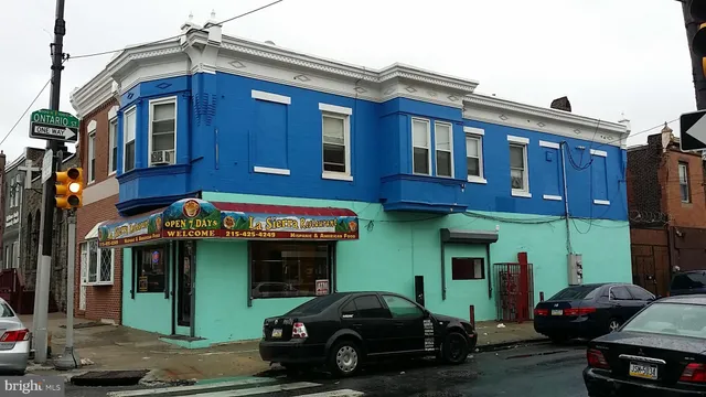 a view of a car park in front of a building