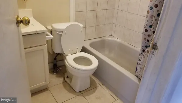 a bathroom with a sink and toilet