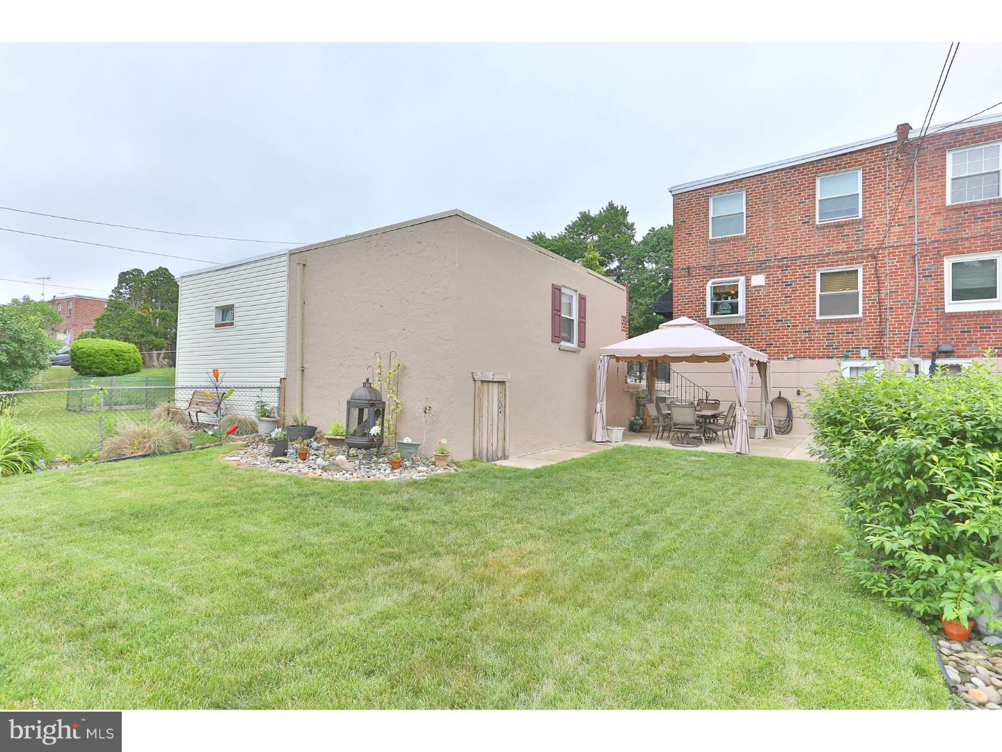 8610 Bridle Road Philadelphia, PA 19115 - Photo 22 of 25 a view of a house with backyard and garden