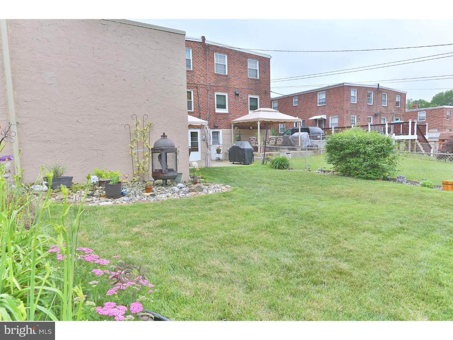 8610 Bridle Road Philadelphia, PA 19115 - Photo 23 of 25 a front view of building with garden