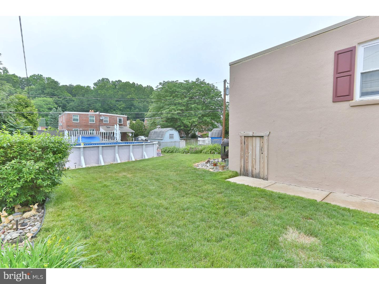 8610 Bridle Road Philadelphia, PA 19115 - Photo 25 of 25 a view of a backyard with a garden