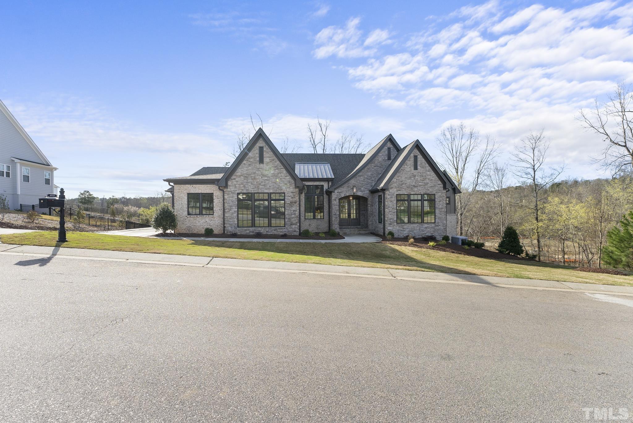 4910 Poyner Road Raleigh, NC 27612 - Photo 4 of 48 a view of house with swimming pool and view of house