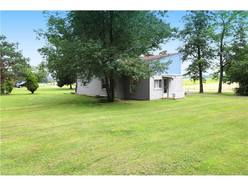 115 Stevenson Road Renfrew, PA 16053 - Photo 15 of 16 Exterior Back. A large level lot!