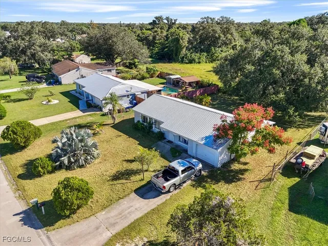 an aerial view of a house with a garden