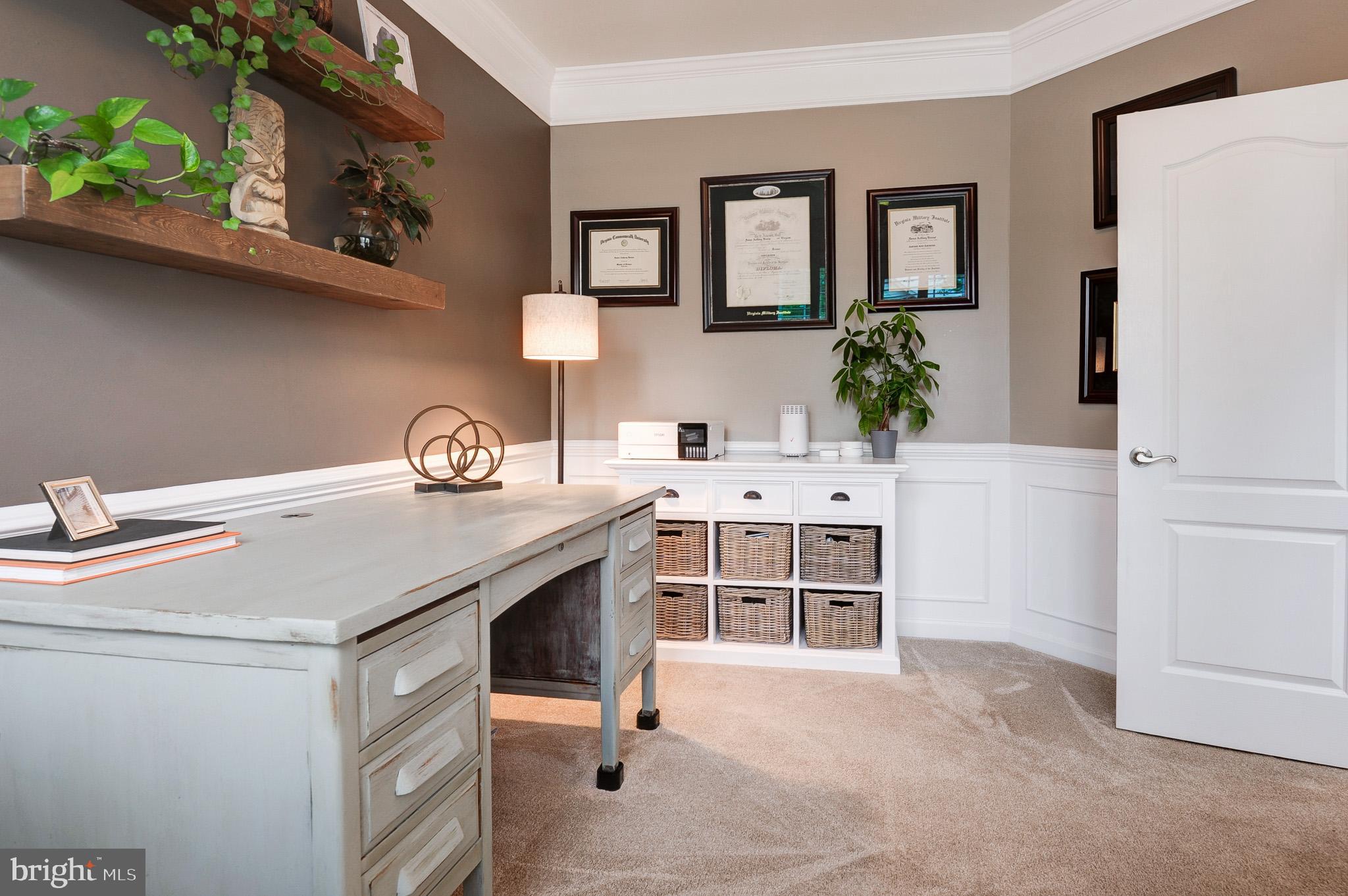 23372 Minerva Drive Brambleton, VA 20148 - Photo 21 of 61 a view of a kitchen with a sink and cabinets