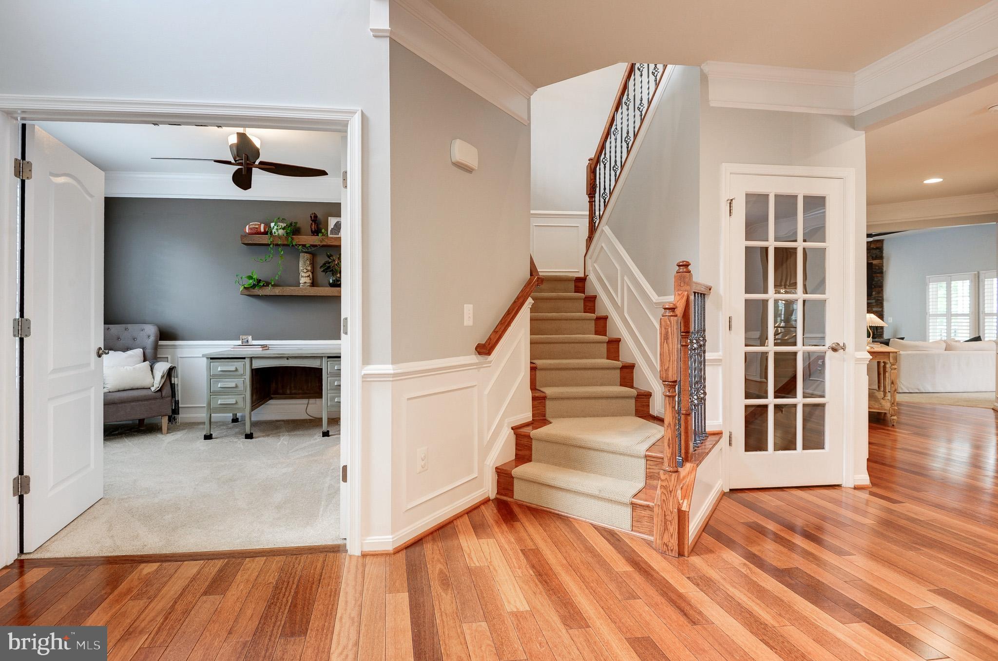 23372 Minerva Drive Brambleton, VA 20148 - Photo 4 of 61 a view of entryway and hall with wooden floor