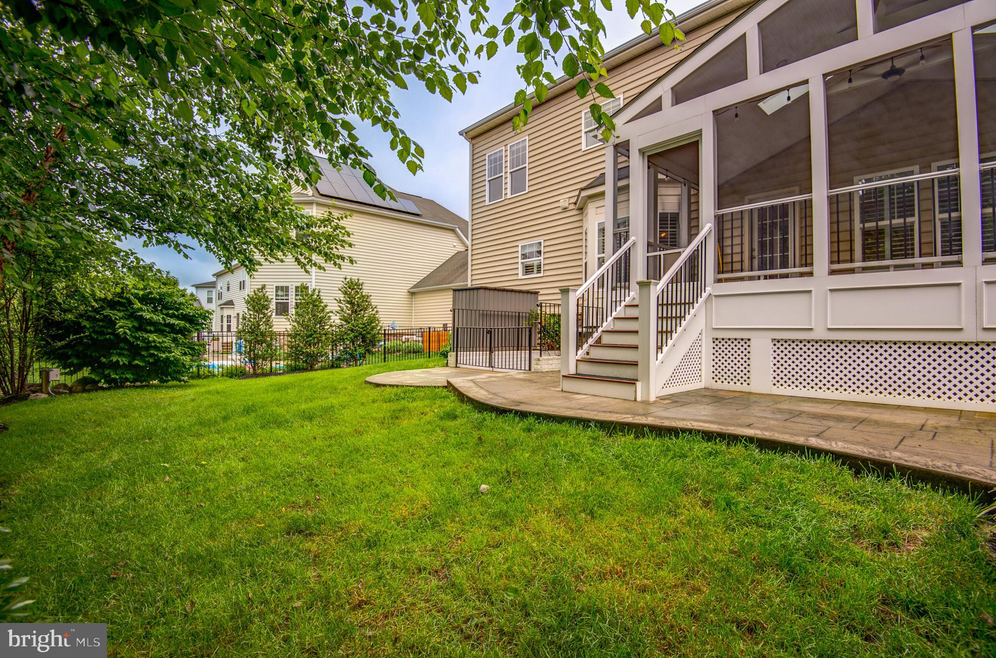 23372 Minerva Drive Brambleton, VA 20148 - Photo 58 of 61 a view of a house with a yard