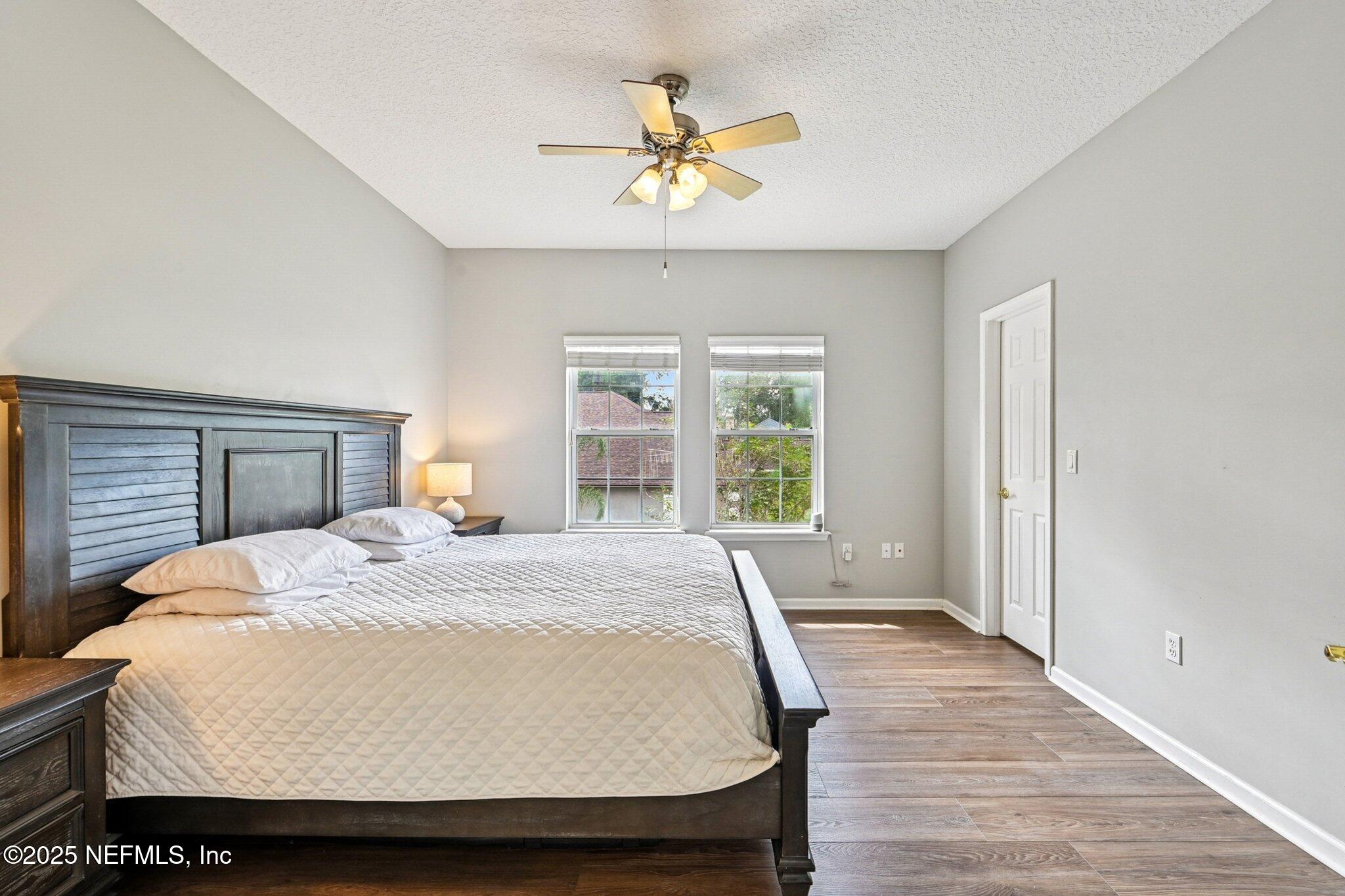 2300 Spring Hill Court Fleming Island, FL 32003 - Photo 28 of 45 a bedroom with a bed and window