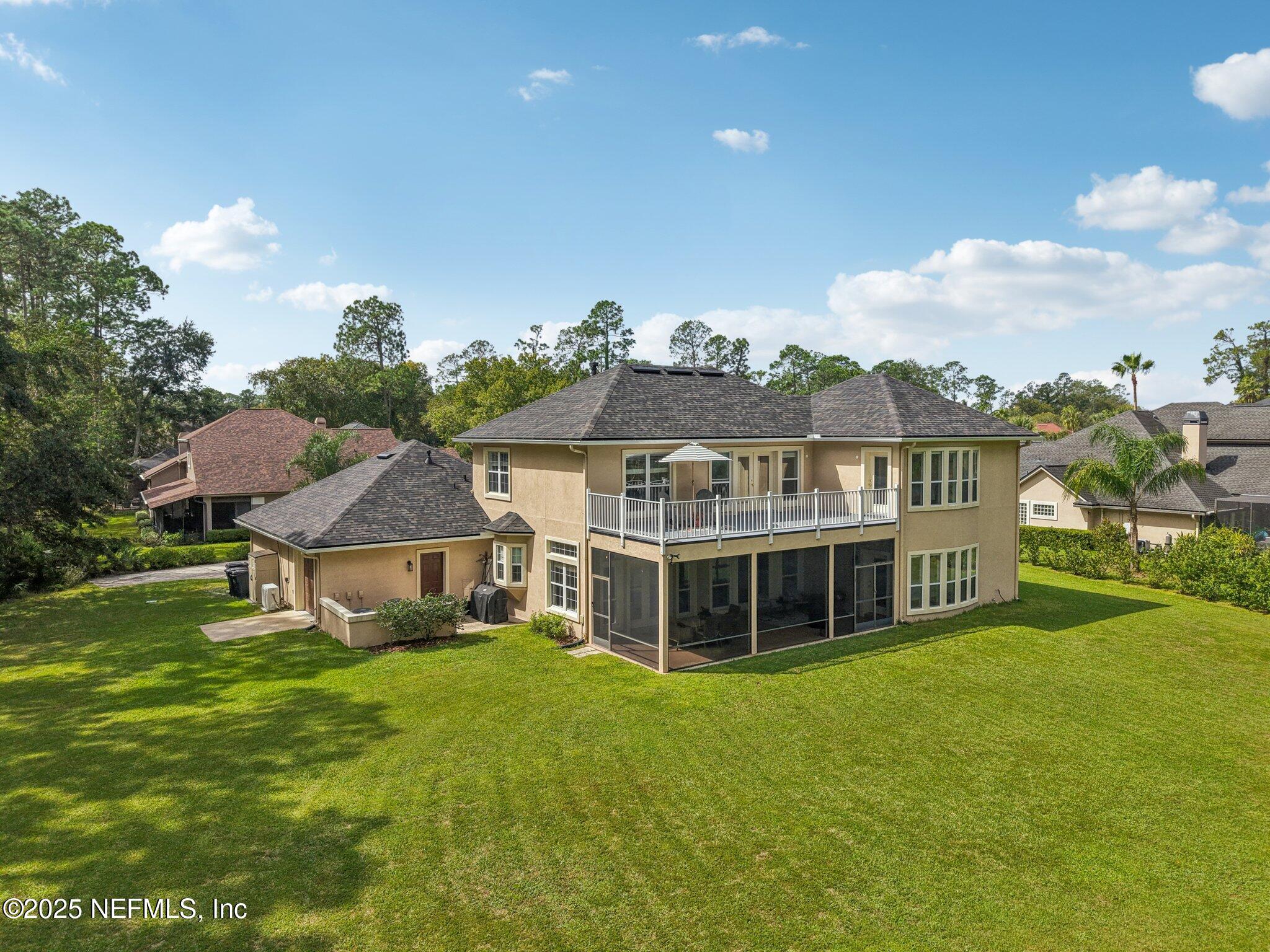 2300 Spring Hill Court Fleming Island, FL 32003 - Photo 31 of 45 a view of a house with a big yard