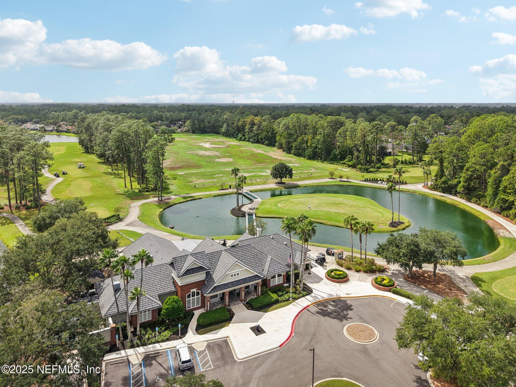 2300 Spring Hill Court Fleming Island, FL 32003 - Photo 39 of 45 a view of a swimming pool with a patio