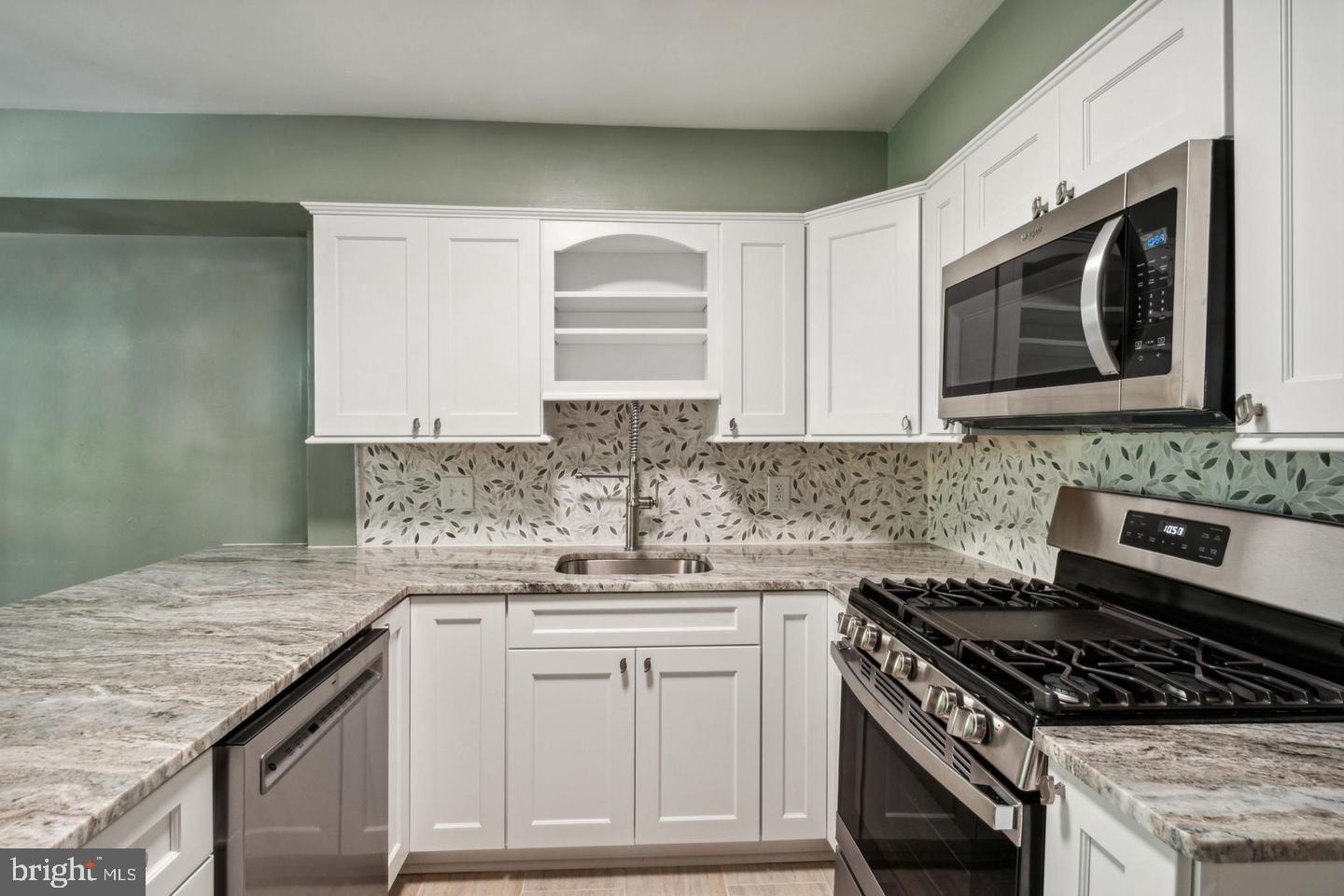 5667 Harpers Farm Road, Unit E Columbia, MD 21044 - Photo 6 of 37 Designer Kitchen