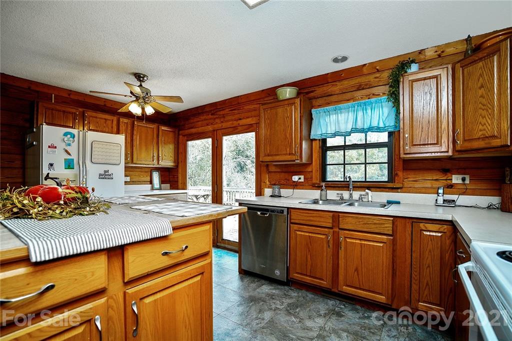 1453 Barger Road Salisbury, NC 28146 - Photo 13 of 41 a kitchen that has a sink and a stove in it
