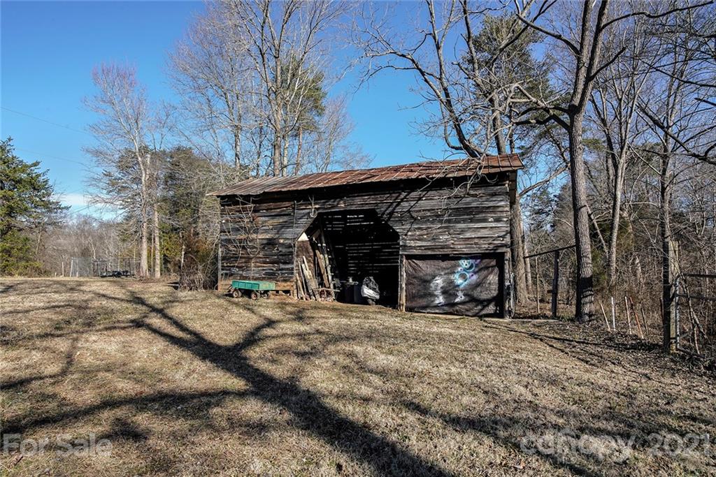 1453 Barger Road Salisbury, NC 28146 - Photo 31 of 41 a view of a house with a snow in the yard