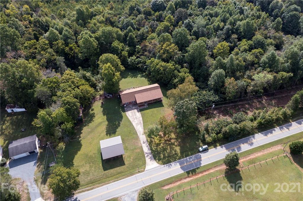 1453 Barger Road Salisbury, NC 28146 - Photo 4 of 41 an aerial view of house with yard swimming pool and outdoor seating