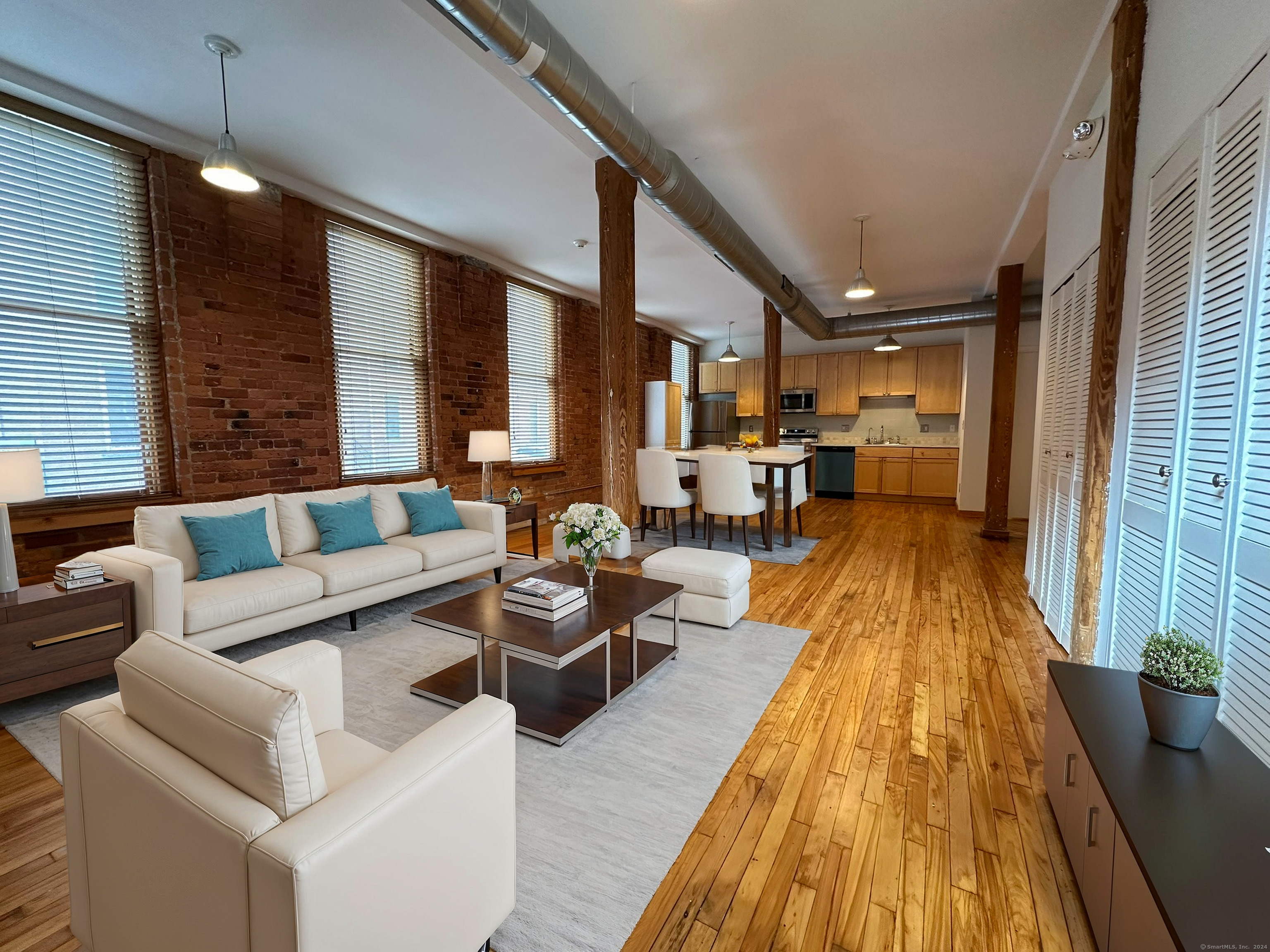 325 Lafayette Street, Unit 5105 Bridgeport, CT 06604 - Photo 1 of 1 Beautiful open layout, 10-foot ceilings, brick walls, hardwood floors, a great space with endless possibilities to arrange the space.