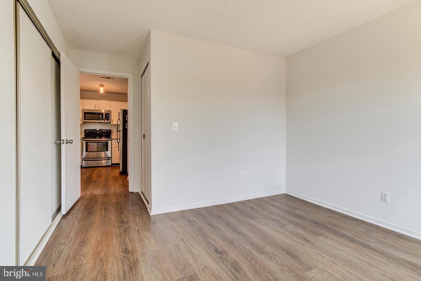 11707 D Summerchase Circle Reston, VA 20194 - Photo 12 of 21 wooden floor in an empty room