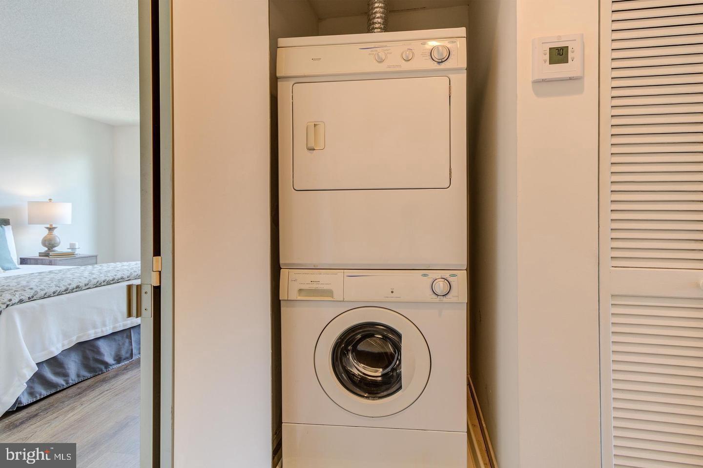 11707 D Summerchase Circle Reston, VA 20194 - Photo 13 of 21 a utility room with dryer and washer