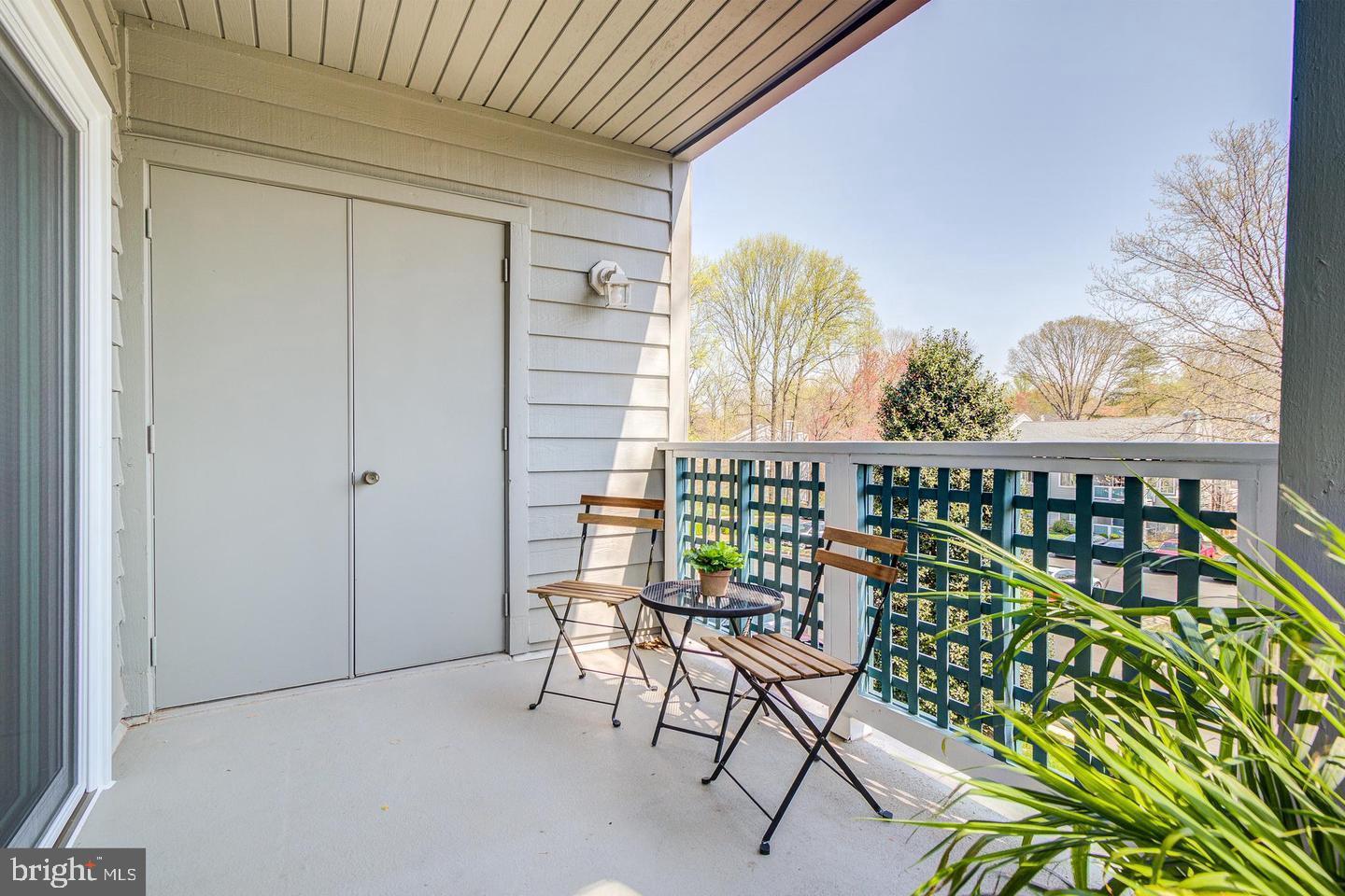 11707 D Summerchase Circle Reston, VA 20194 - Photo 3 of 21 a view of a balcony with furniture