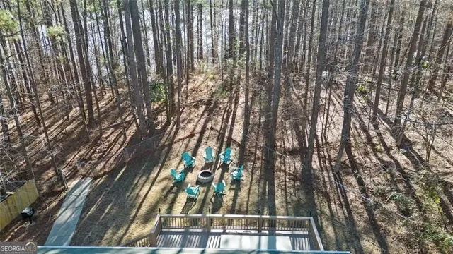 a view of a backyard of the house