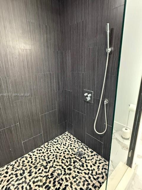 2430 Southwest 22nd Terrace, Unit 2430 Miami, FL 33145 - Photo 6 of 7 a bathroom with a shower