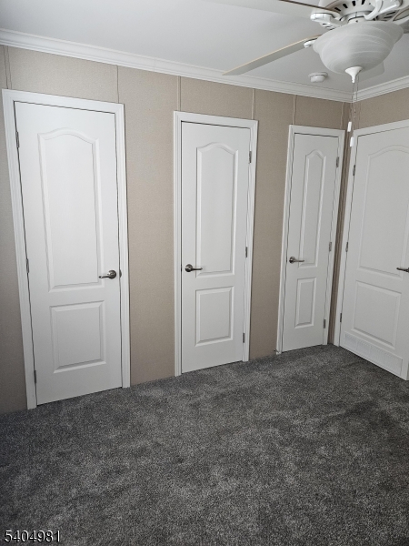 44 Ridge Road, Unit 13 Oak Ridge, NJ 07438 - Photo 11 of 17 an empty room with closet area