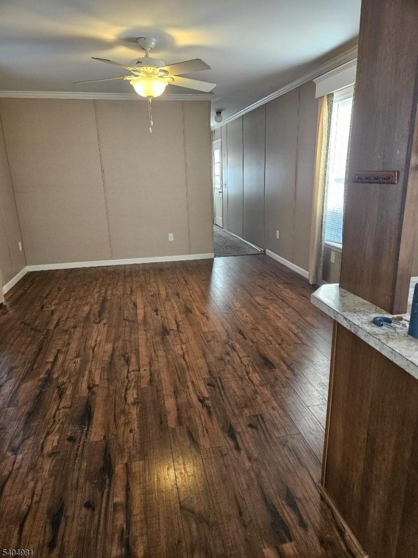 44 Ridge Road, Unit 13 Oak Ridge, NJ 07438 - Photo 4 of 17 a view of a room with wooden floor