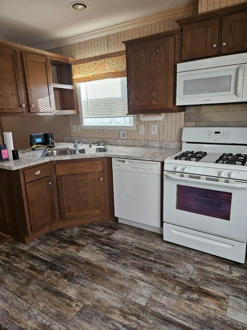 44 Ridge Road, Unit 13 Oak Ridge, NJ 07438 - Photo 5 of 17 a kitchen with a stove and a sink