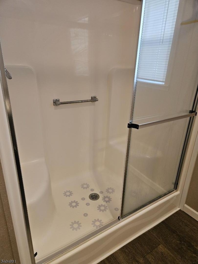 44 Ridge Road, Unit 13 Oak Ridge, NJ 07438 - Photo 10 of 17 a bathroom with a shower